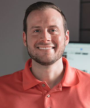 headshot of Evan our sales and marketing director